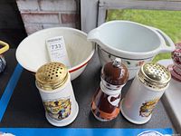 Full lot showing two bowls, pair of cheese shakers and pepper mill