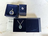 Overview of all three Stauer jewellery pieces in cases