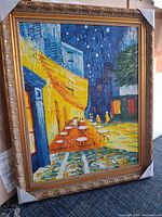 full view of framed reproduction painting with gold frame