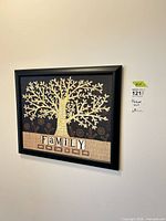 Full view of framed family tree wall art on wall