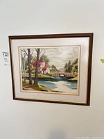 Full view of framed textile art on wall