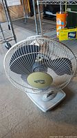 Front view of Hampton Bay desk fan showing full unit