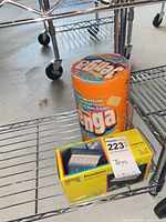 Jenga tube and Pavilion domino box on shelf