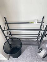 shoe rack and waste bin together for scale and completeness