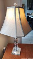 Full lamp with shade illuminated