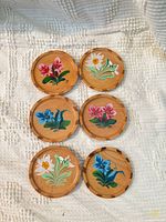 All six wooden coasters displayed front side up