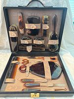 Open grooming set showing all items in case