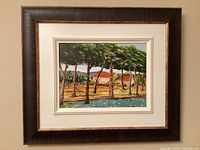 Full view of framed landscape painting