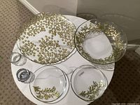 Overview of all six glass pieces displayed on table