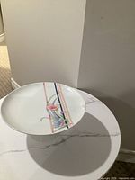 angled view of cake stand on pedestal