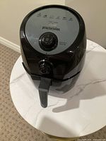 Front and top view of Proctor Silex air fryer