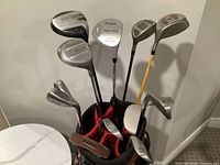 Top view showing assorted club heads in bag opening