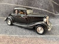 Front-side view showing overall design, paint, trim and wheels