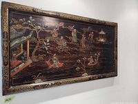 Full view of entire Chinese lacquered wood panel mounted on wall