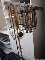 Group of necklaces hanging on rack