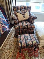 Chair, ottoman and pillow overall view