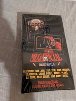 Front of sealed Megametal wax box with band photos and logos visible