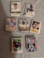 Six stacks of modern baseball cards showing various Topps and Panini fronts including Matthew Boyd and Austin Meadows