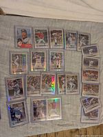 Full layout of 22 sleeved Topps Chrome refractor cards