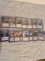 Front view of first group of sleeved, toploaded extended-art MTG rares