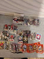 Overhead view of entire lot showing loose cards, sealed mini-packs and box