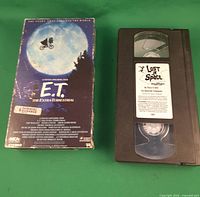 E.T. slipcover and Lost in Space cassette side by side