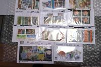 Overview of 11 stock cards with Canadian and Irish stamps