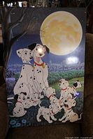 Full view of mounted poster showing all characters and moon background