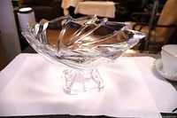 Side view showing pedestal base and swirl body