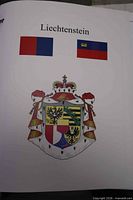 Album title page with Liechtenstein flags and coat of arms