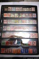 Front view of first stock page showing six rows of GB stamps