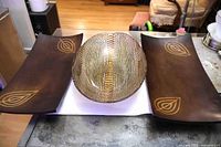 Two wooden trays and oval glass bowl displayed