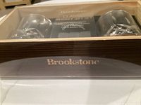 sealed wooden box showing Brookstone logo and glimpse of glasses