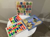 All four puzzles displayed on table