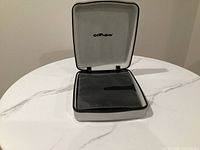 Case open displaying interior sleeves