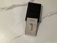 Secrid box with product information card displayed