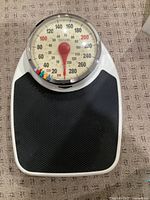 Full view of Taylor scale showing white body and black platform