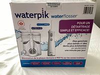 Front of sealed retail box showing product images and branding