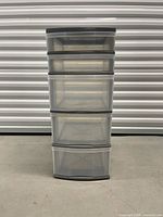Front view of grey plastic 5-drawer tower