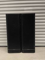 Front view of both Kenwood speakers side by side