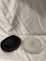 Both plates side by side showing overall shape and size contrast