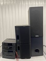 Complete lot with tower speaker, component stack, bookshelf speakers and wire