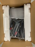 CD changer in original box with styrofoam and plastic