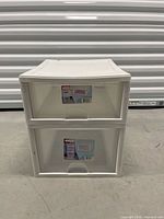Front view of two stacked white Sterilite drawer units