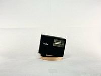 Angled front view showing Rollei logo and flash head