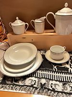 Group view of dinnerware pieces on display