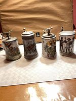 All four steins front view