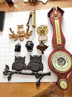 Group shot showing all door knockers and barometer