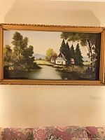 Full view of framed painting on wall