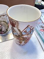 Handle-less beaker with 1897 design and visible crack